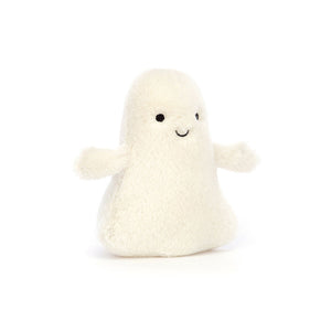 Smiling spook! Angled view of Jellycat Ooky Ghost with soft buttercream fur.