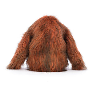 Back view:  Don't forget the long arms! Oswald Orangutan by Jellycat is ready for rainforest adventures with his soft fur, friendly face, and cuddly arms.