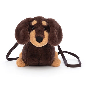 Straight on view: Walk hands-free with Jellycat Otto Sausage Dog Bag crossbody bag, shaped like a sausage dog, features a comfy strap,