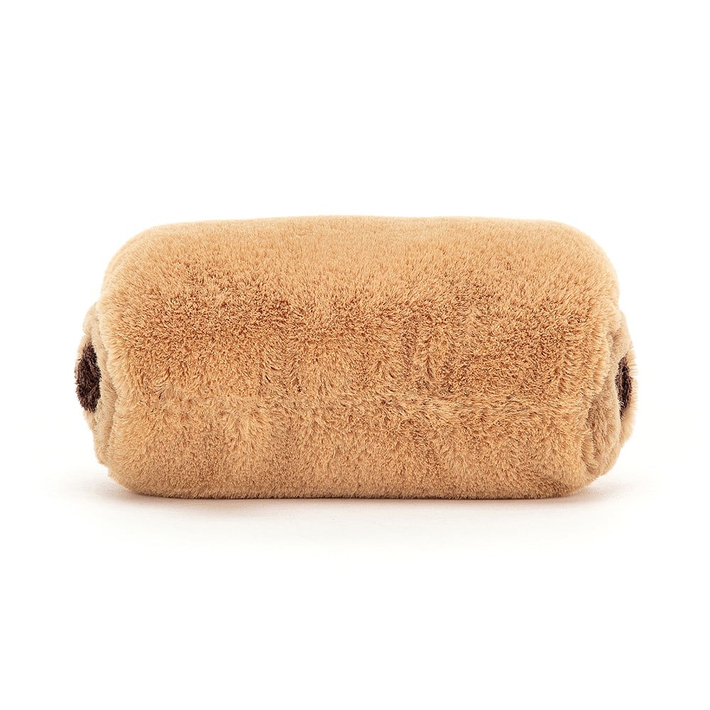 Back view: Cuddly croissant companion? Yes, please! Amuseable Pain Au Chocolat, a Jellycat plush boasts golden faux fur.
