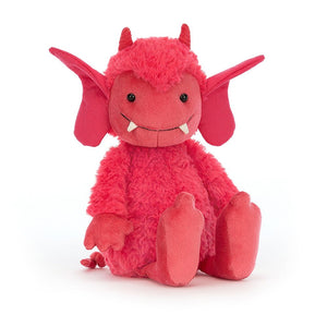 Angled View: Jellycat Pandora Pixie is ready for a romp! This strawberry plush pixie features fuzzy fur, wiggly ears, funky fangs, and a curly tail, perfect for mischievous adventures.