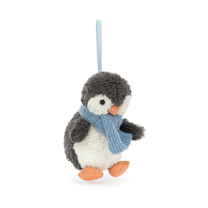 Jellycat Peanut Penguin Decoration, angled view, soft plush toy with blue-black fur and heart-shaped face.