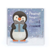 Hardback Jellycat Peanut Penguin’s Perfect Present book with illustrated penguin holding a gift on a snowy blue cover.