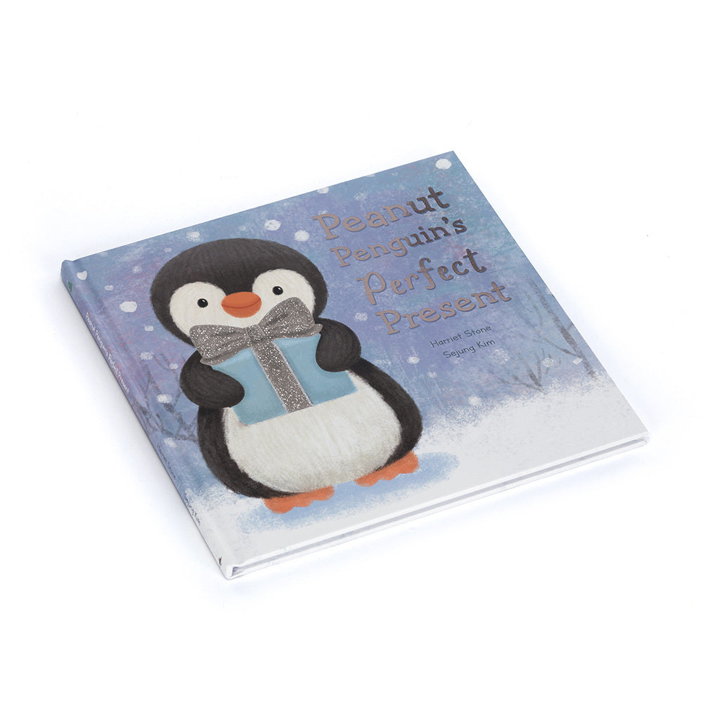 Jellycat Peanut Penguin’s Perfect Present hardback book angled on a white background.