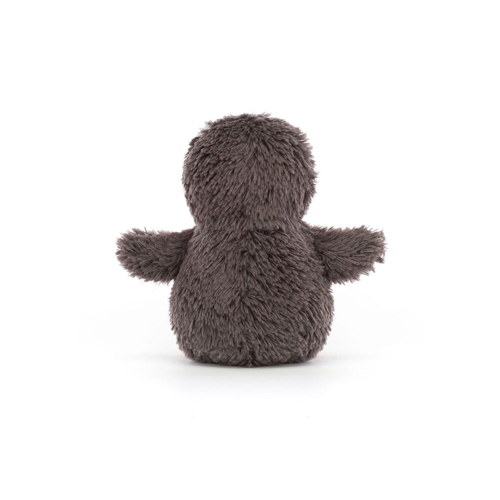 Back view of Jellycat Peanut Penguin Small - A rear view of the plush toy displaying its cuddly grey fur and outstretched wings.