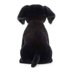 Behind View:  Don't miss the love! The Jellycat Pippa Black Labrador has a luxuriously soft black coat, floppy ears, and a sweet little tail. 