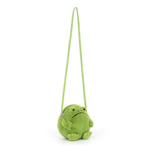 Angled view: This cuddly Jellycat bag, the Ricky Rain Frog Bag, features a plush body, and showcasing the long strap.