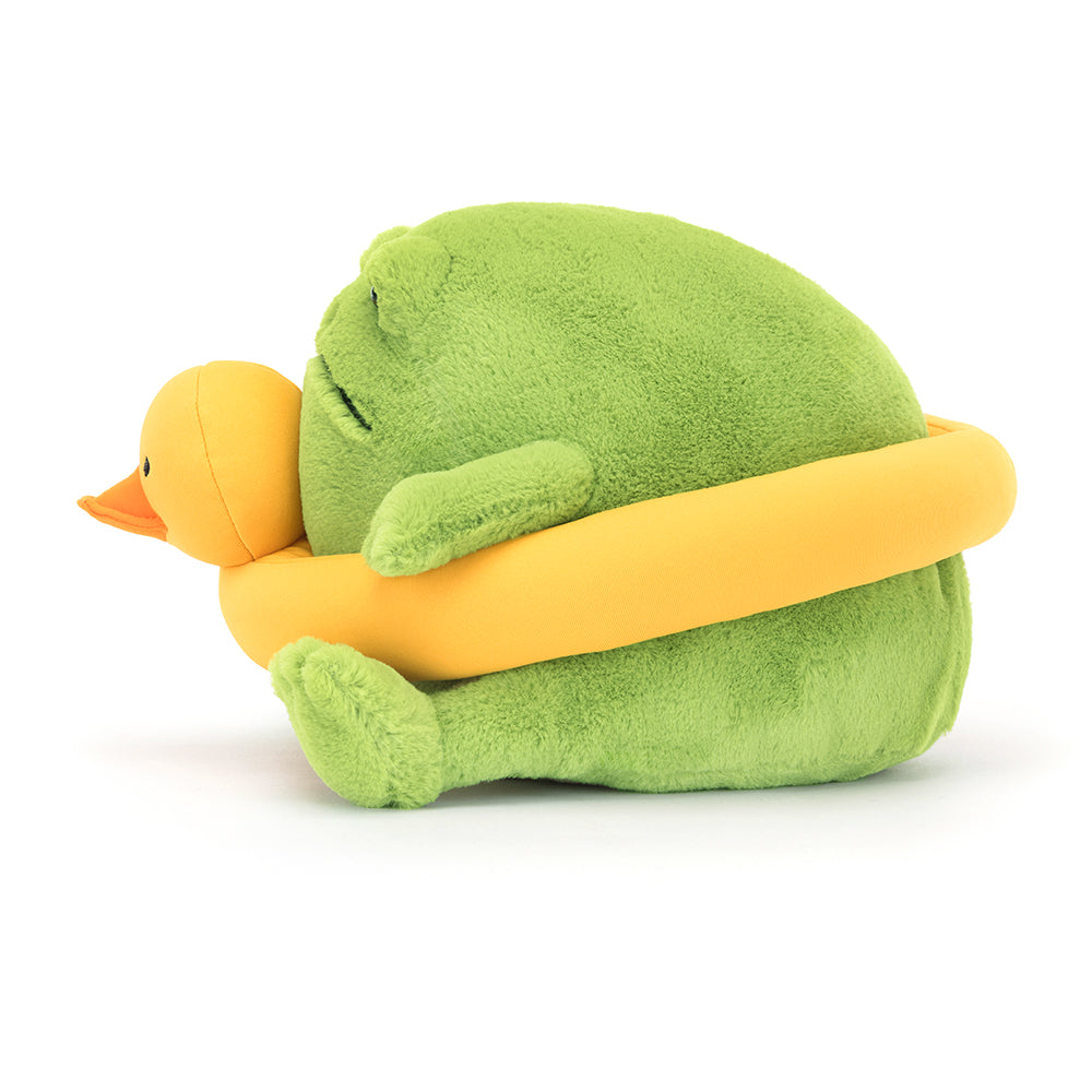 Side profile of the Jellycat Ricky Rain Frog Rubber Ring, showing his full form, yellow duck ring, and squishy build perfect for cuddles.