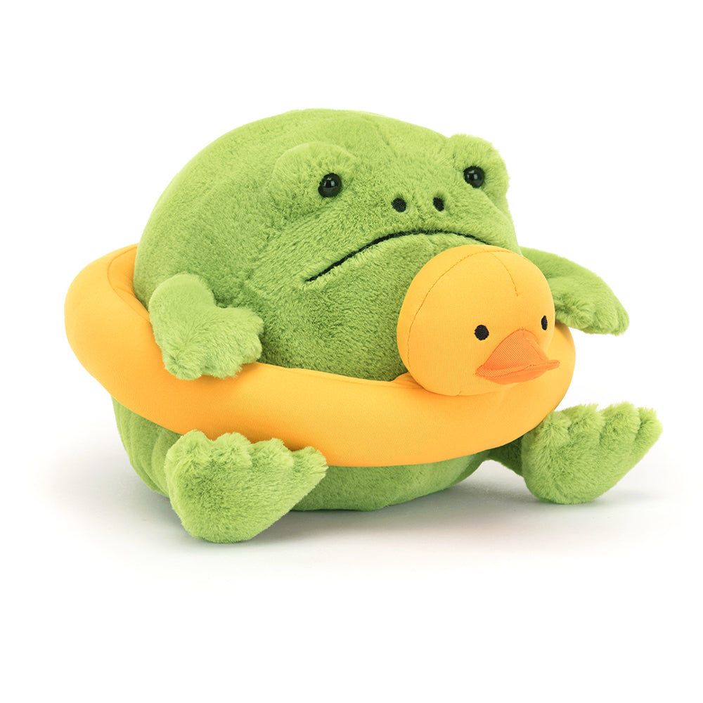 Jellycat Ricky Rain Frog Rubber Ring at an angle, showcasing his iconic expression, squishy form, and bright yellow duck ring ready for summer fun.