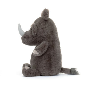 Side View:  Spark your child's love for safari animals with Jellycat Roderick Rhinoceros! This 37 cm plush boasts soft fur, a textured design, and a friendly face, making him a cuddly companion for playtime or bedtime.