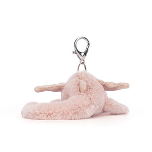 Jellycat Rose Dragon Bag Charm from the back, emphasizing its plush fur, glitter accents on the wings, and silver claw clip.