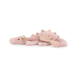 Side View: Side view of Jellycat Rose Dragon showing soft pink fur, shimmery wings, chunky paws, and a long, curvy tail.