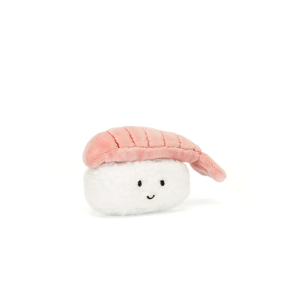Angled view: Jellycat Sassy Sushi Nigiri makes a statement! This soft plush sushi features a pink shrimp hat with stitched details, perched on a bed of fluffy rice. 