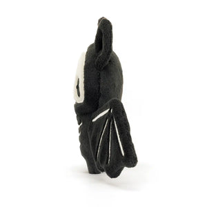 Soft Jellycat Skelebat Jim plush (side view) with slate fur & stiffened wings.