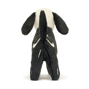 Back: Cuddly Skeledog Dan plush (back view) with embroidered ribs, soft vanilla skull and black tail.