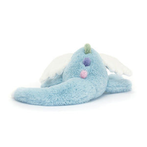 Back View: Backside of the Jellycat Sky Dragon showcases the long, sky-blue body with its vibrant rainbow spine. This whimsical dragon adds a touch of wonder to any playtime adventure!