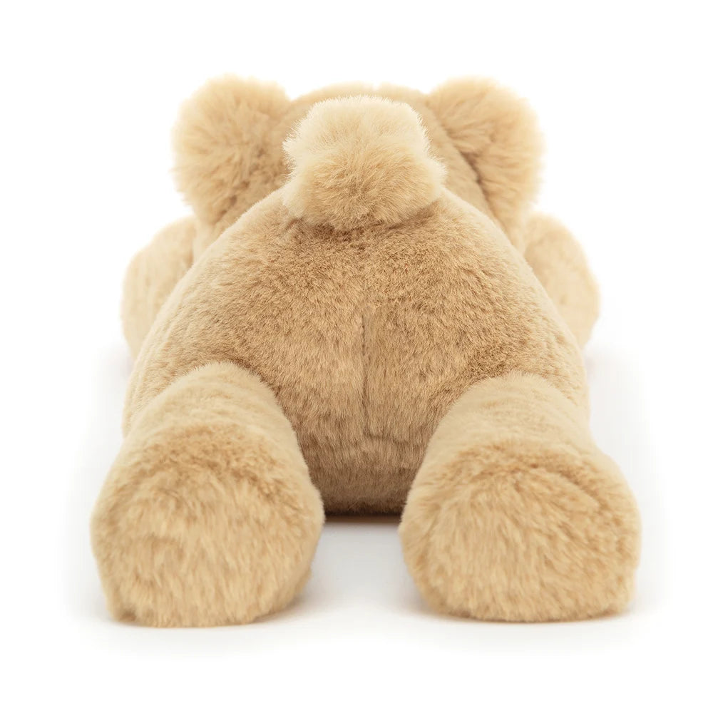 Back view: Don't forget the paws! Smudge Bear by Jellycat is ready for bedtime snuggles with his luxuriously soft fur, honey hues, and cute little podgy paws. 