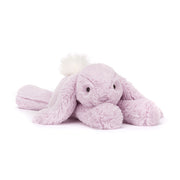 Angled view of Jellycat Smudge Lavender Rabbit, highlighting its long, floppy ears and cuddly design.