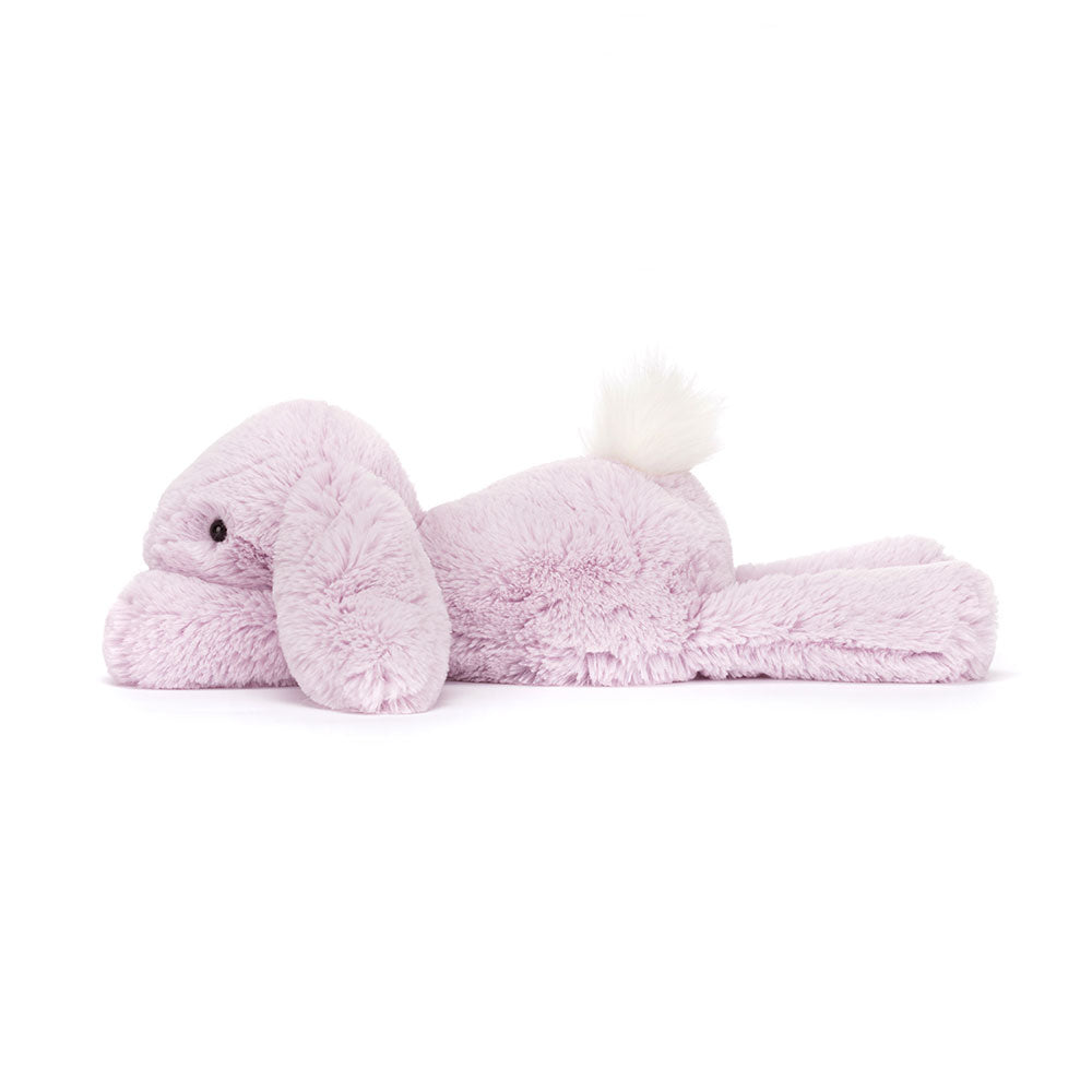 Side view of Jellycat Smudge Lavender Rabbit, displaying its adorable profile and soft body.