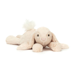 Angle view of Jellycat Smudge Rabbit, highlighting its long, floppy ears and cuddly design.