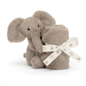The Jellycat Smudge Elephant Soother, a cuddly elephant with a square soother, offers warm hugs & sweet dreams!