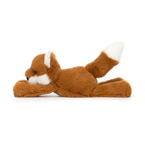  Side view of Jellycat Smudge Fox, featuring its super soft dark orange fur, long, huggable body, playful "trumpet legs" perfect for grabbing, and a chunky cream-tipped tail.