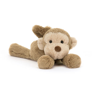 Jellycat Smudge Monkey plush toy lying down with a cute expression.