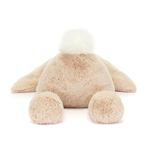 A rear view of Jellycat Smudge Rabbit with his white fluffy tail. 
