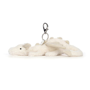 A side view of Jellycat Snow Dragon Bag Charm 
