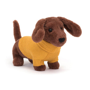 Front view of Jellycat Sweater Sausage Dog Yellow plush toy with a soft yellow sweater and floppy ears.