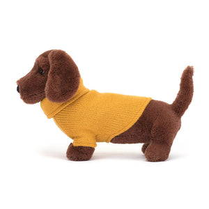 Side view of Jellycat Sweater Sausage Dog Yellow showcasing its long body and wagging tail.