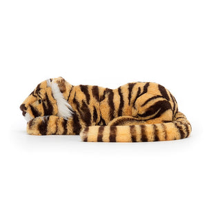 Side View: Don't be fooled by the stripes! This cuddly Jellycat Taylor Tiger features soft fur, a relaxed expression, and adorable cheeks.(Little: 29cm x 8cm)