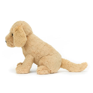 Side view of golden friendship: Jellycat's Tilly showcases her soft fur, loyal stance, & firm beanie paws from the side. Ready for adventures!