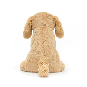 Wagging tail awaits: The back view of Jellycat's Tilly reveals her soft fur, playful tail, & adorable form. Perfect for cozy snuggles after playtime.