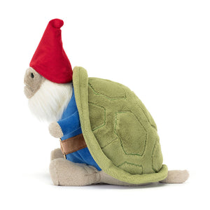 Side profile of the Jellycat Timmy Turtle Gnome plush, showing his detailed green shell and his red hat.