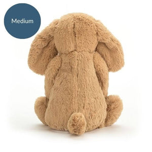 Golden sunshine & playful spirit! Jellycat Toffee Puppy's tail wags with warmth. Shop now & add joy to any day!