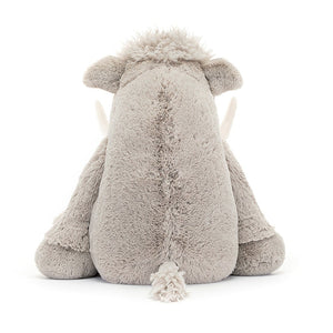 Back View: Jellycat Vigo Mammoth displayed from behind, showcasing the warm grey fur and huge tusks.