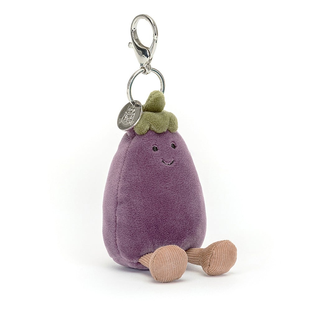 Sitting:  Aubergine charm break! The Jellycat Vivacious Aubergine Bag Charm sits patiently, ready to clip onto your favorite bag. Luxuriously soft purple fur and a vibrant green stalk complete the look. 