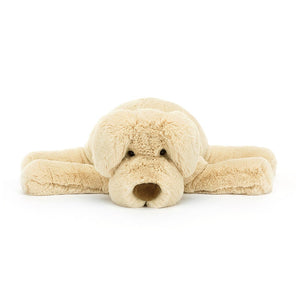 Super-soft cuddles guaranteed: This frontal view of Jellycat's Wanderlust Puppy highlights his adorable face.