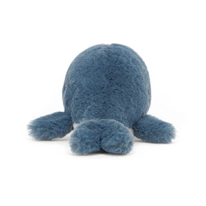 Behind View: Don't miss the tail wags (almost)! The Jellycat Wavelly Whale Blue has a deep blue coat and a cute little tail.