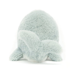 From Behind: The Jellycat Wavelly Whale Grey (13cm x 8cm) features soft fur, flappy fins, and is ready to explore the ocean with your little one.
