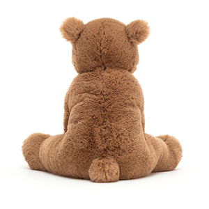 Back View: Jellycat Woody Bear Highlighting his fluffy round tail and soft chocolate fur.