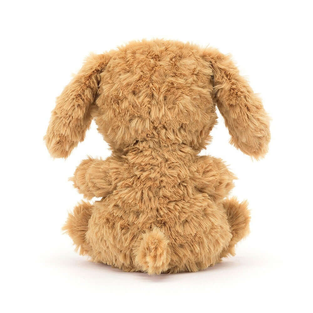 An image taken from behind of the Jellycat Yummy Puppy children's soft toy. 