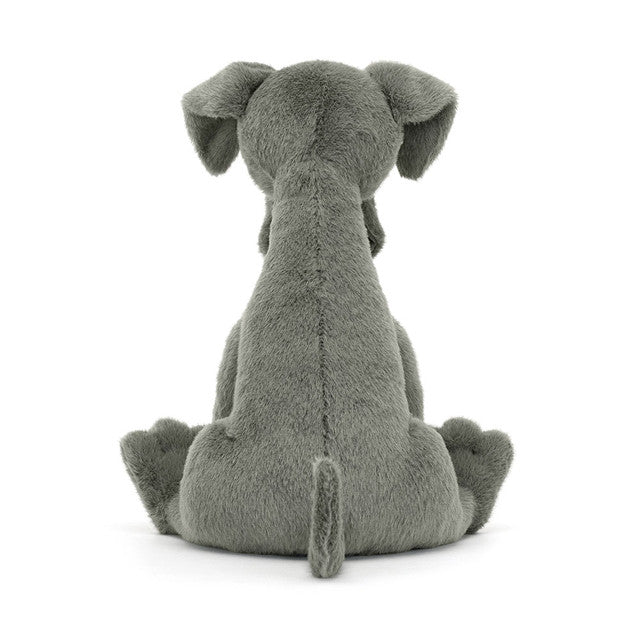 Back View: Backside of the Jellycat Zeus Great Dane showcases the soft blue-grey fur and a cute, wagging tail. This majestic plush pup adds a touch of canine companionship to any playtime adventure! 