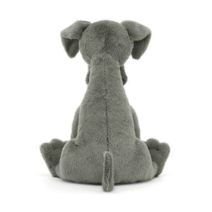 Back View: Backside of the Jellycat Zeus Great Dane showcases the soft blue-grey fur and a cute, wagging tail. This majestic plush pup adds a touch of canine companionship to any playtime adventure! 