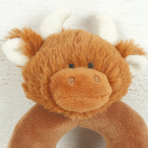 Close up of the Jomanda Highland Cow Plush Baby Rattle.