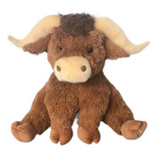 Children's soft toy highland cow covered in thick fluffy brown fun and with horns.