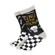 Men’s black bamboo socks with “King of the Kitchen” slogan, chef’s hat, utensils, and black-and-white checkerboard pattern.