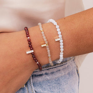 Labradorite & Beads Healing Bracelet worn on the wrist with other bracelets – A stylish and meaningful gemstone bracelet stacked with other healing crystal jewellery.