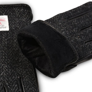 Close-up of the glove cuff revealing soft black fleece lining and luxurious Harris Tweed® outer material.